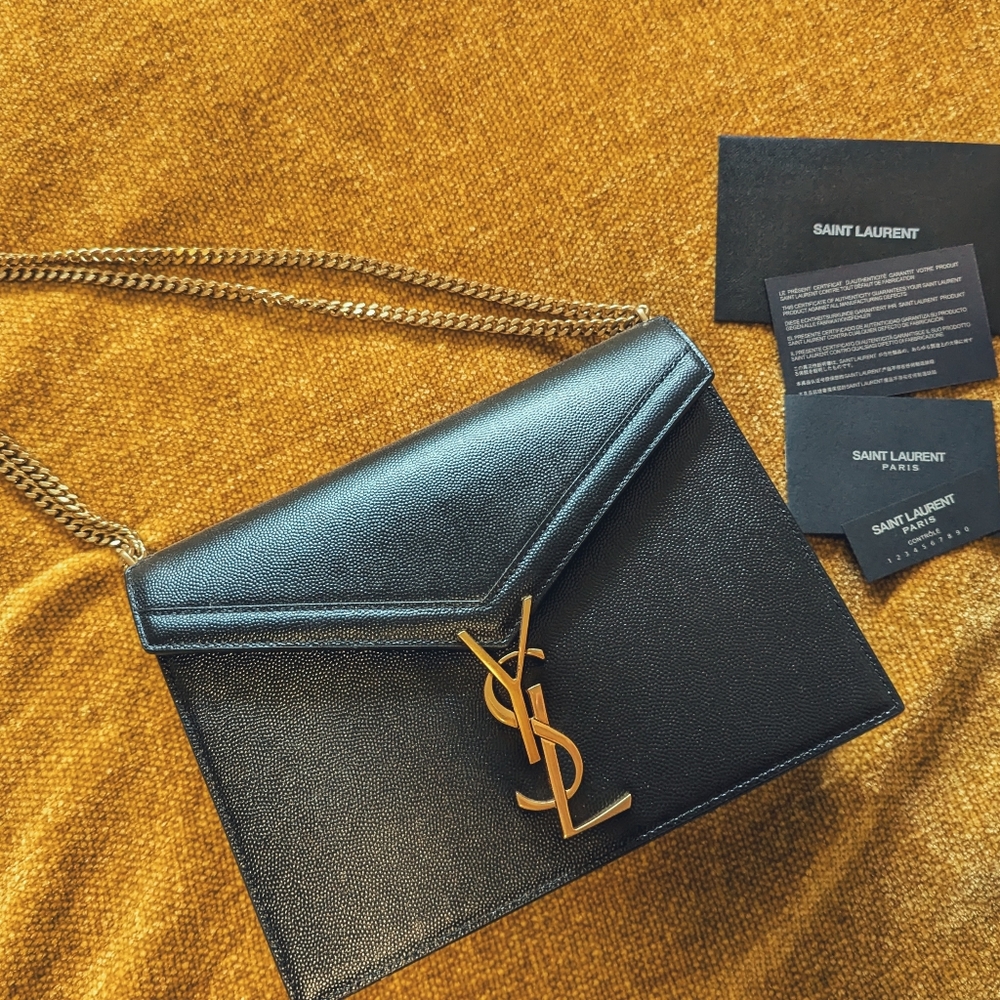 Saint Laurent Black and Gold Shoulder Bag with Iconic YSL Logo